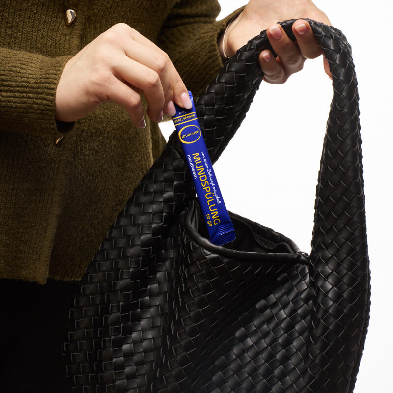 vannandi in handtasche